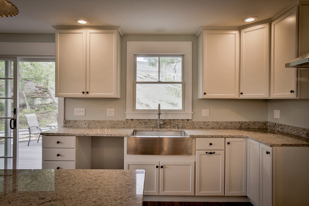 22 Marble Road Gloucester, MA 01930 - Photo 3 of 25 a kitchen with granite countertop a sink window and cabinets