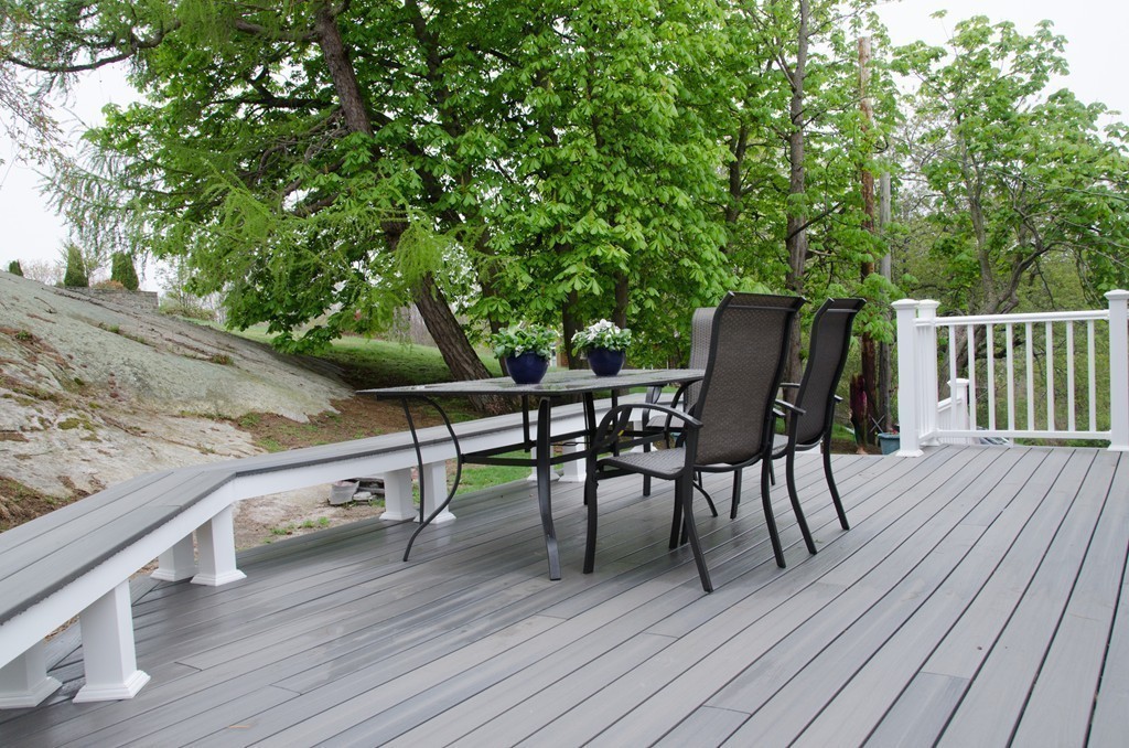 22 Marble Road Gloucester, MA 01930 - Photo 10 of 25 a view of a chairs and table on the wooden deck
