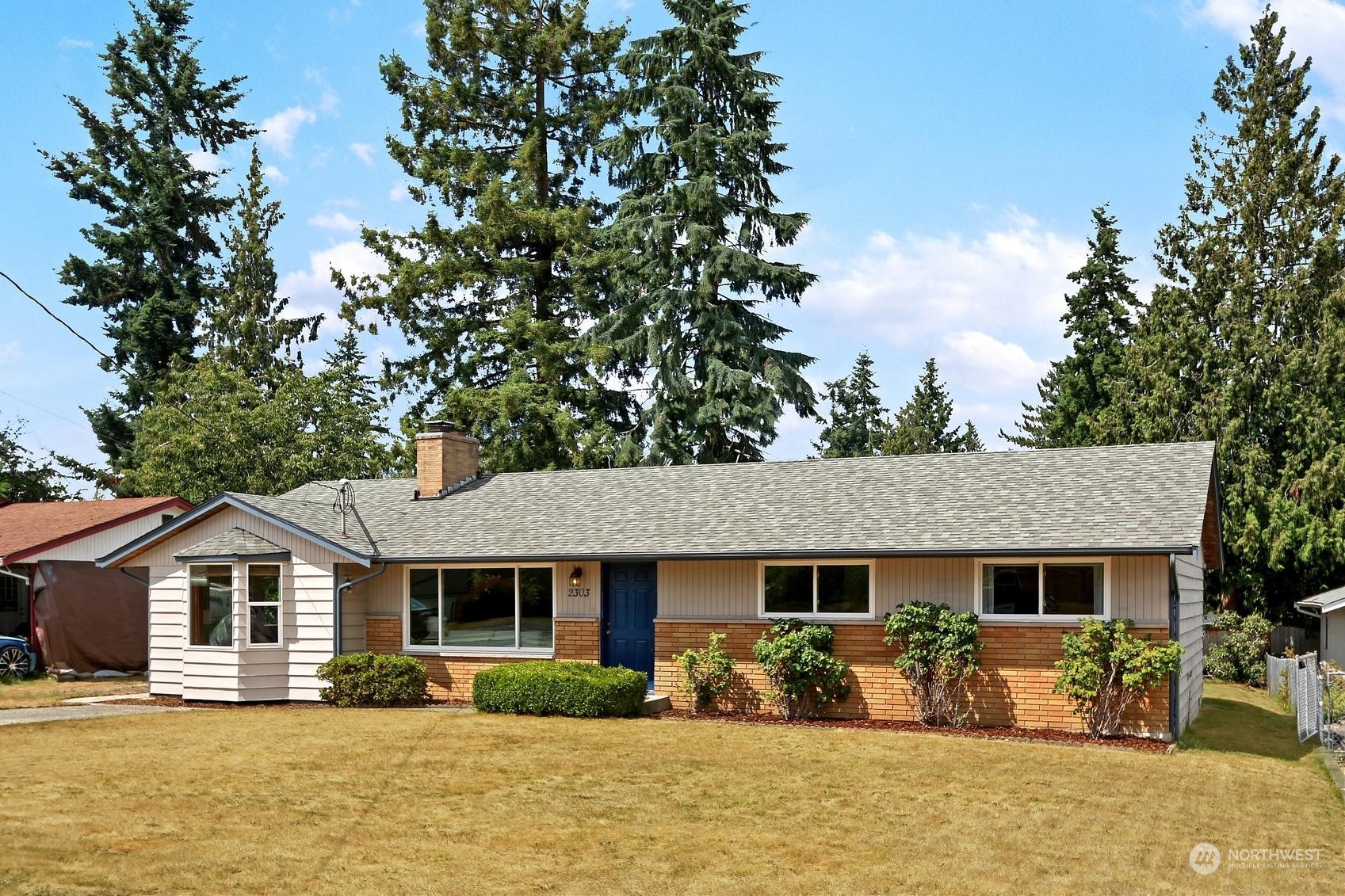 2303 Burley Drive Everett, WA 98208 - Photo 1 of 22 a front view of a house with a yard