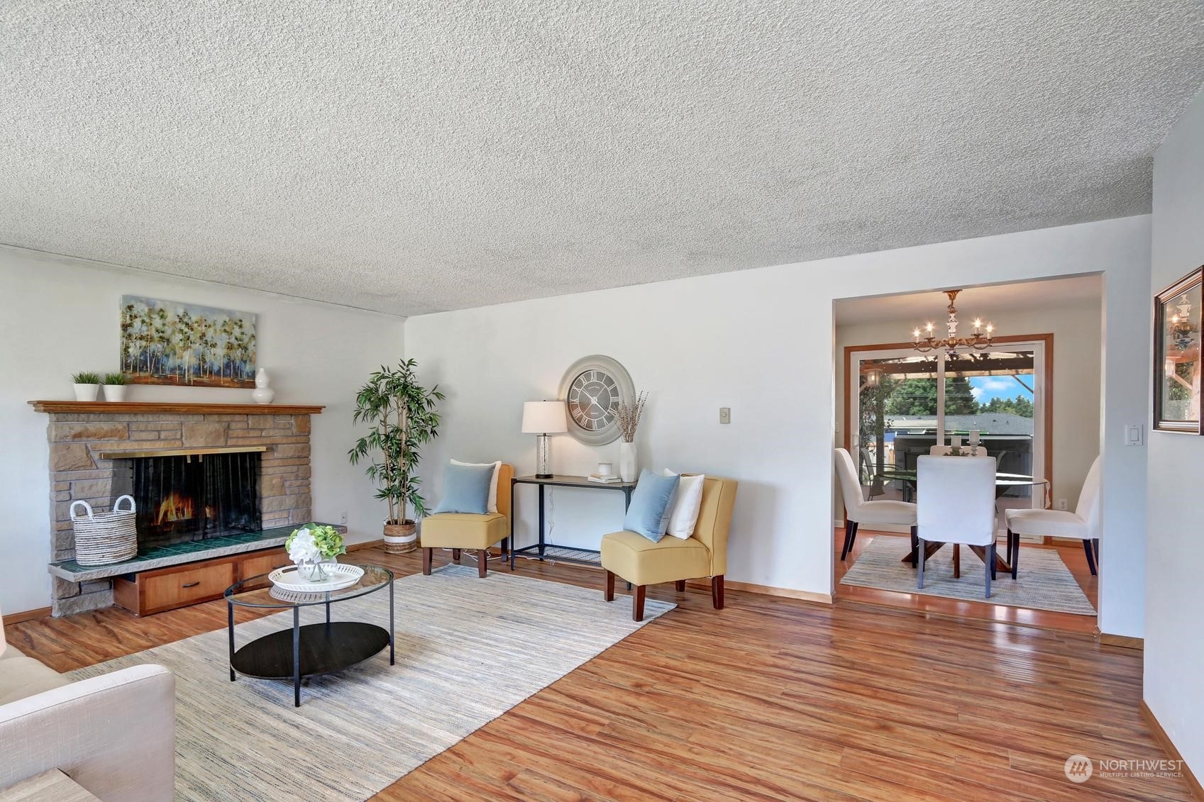 2303 Burley Drive Everett, WA 98208 - Photo 3 of 22 a living room with furniture and a fireplace