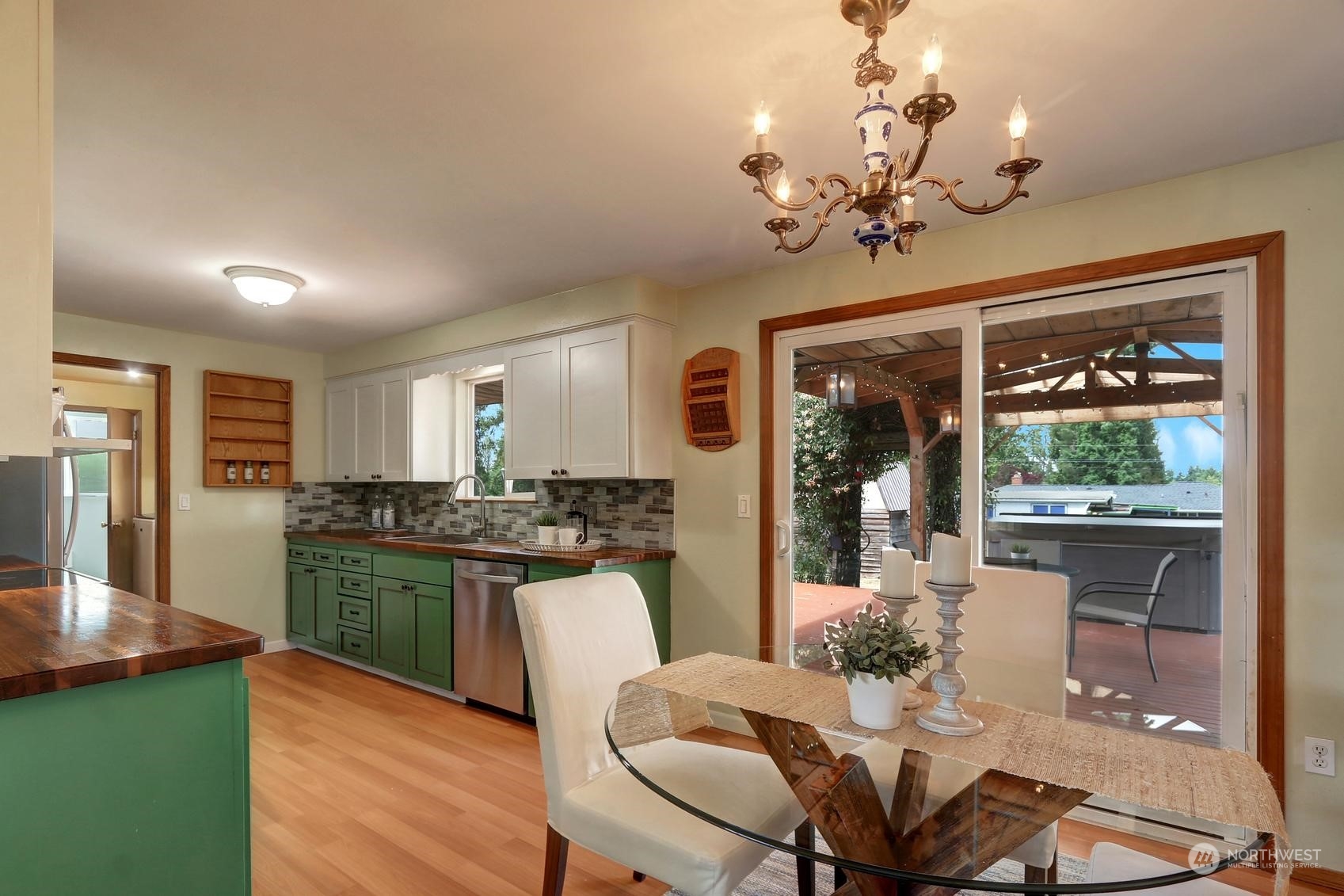 2303 Burley Drive Everett, WA 98208 - Photo 7 of 22 a view of a dining room with furniture wooden floor and chandelier