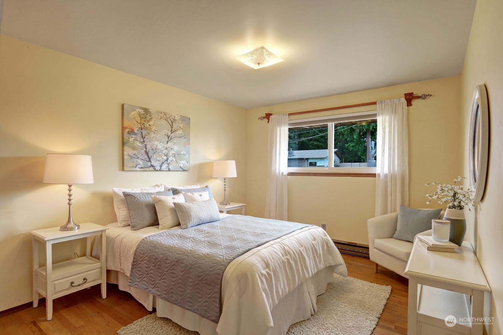 2303 Burley Drive Everett, WA 98208 - Photo 10 of 22 a bedroom with a bed and a night stand