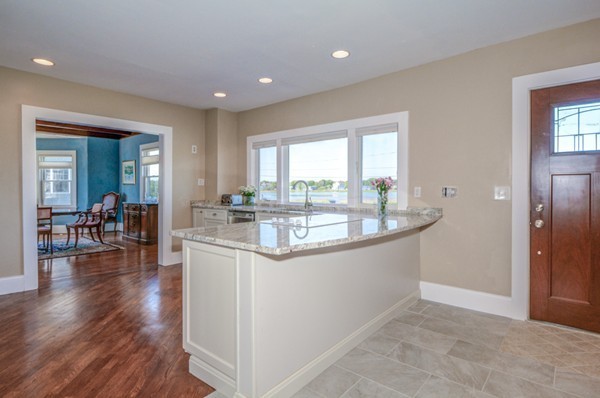 45 Surfside Road Scituate, MA 02066 - Photo 7 of 29 a dining hall with stainless steel appliances granite countertop a granite counter tops and a large window