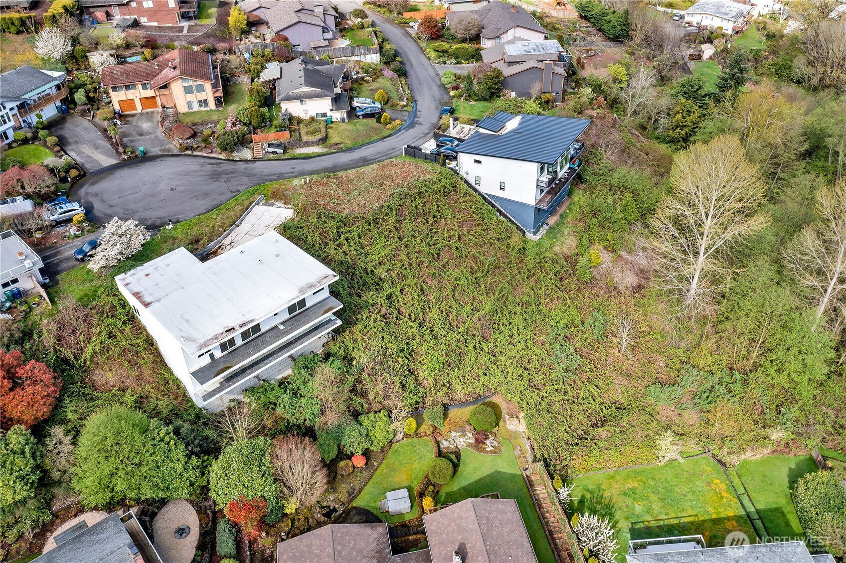 0 Southwest 297th Street Federal Way, WA 98023 - Photo 12 of 16 an aerial view of a house with swimming pool and outdoor seating