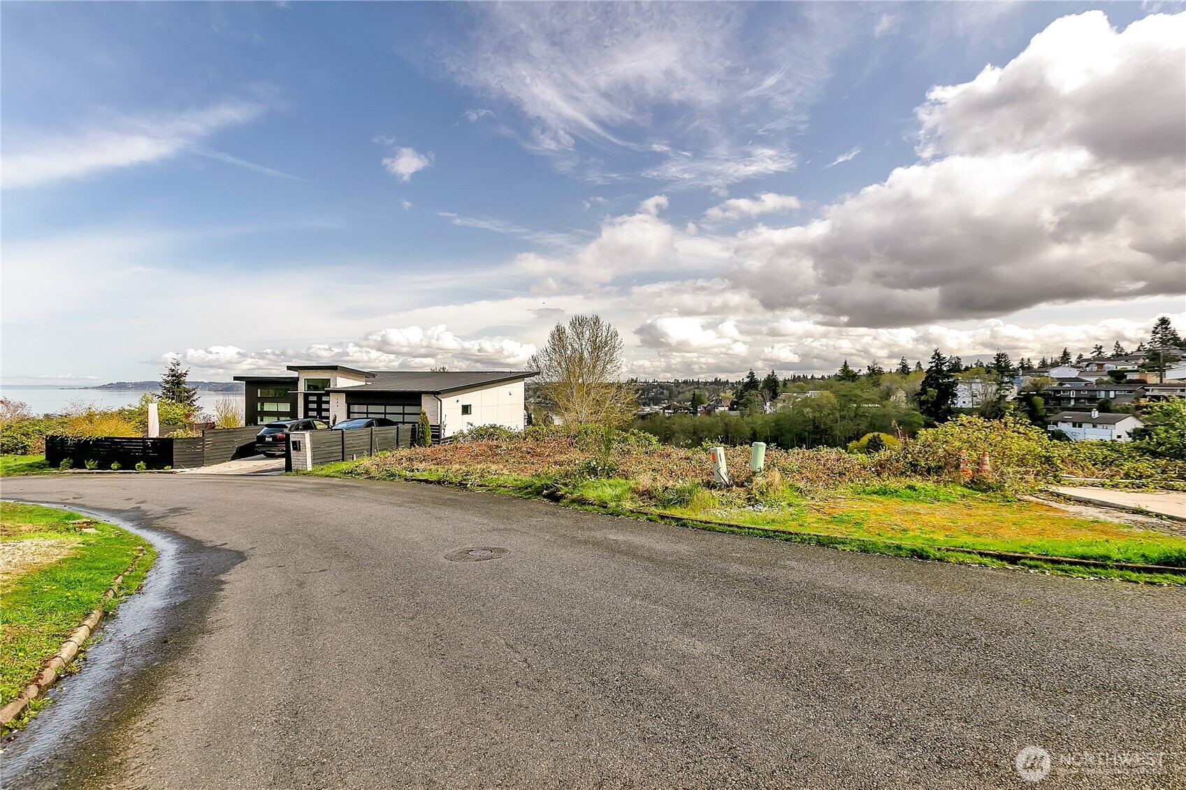 0 Southwest 297th Street Federal Way, WA 98023 - Photo 13 of 16 a view of a house with a yard and car parked