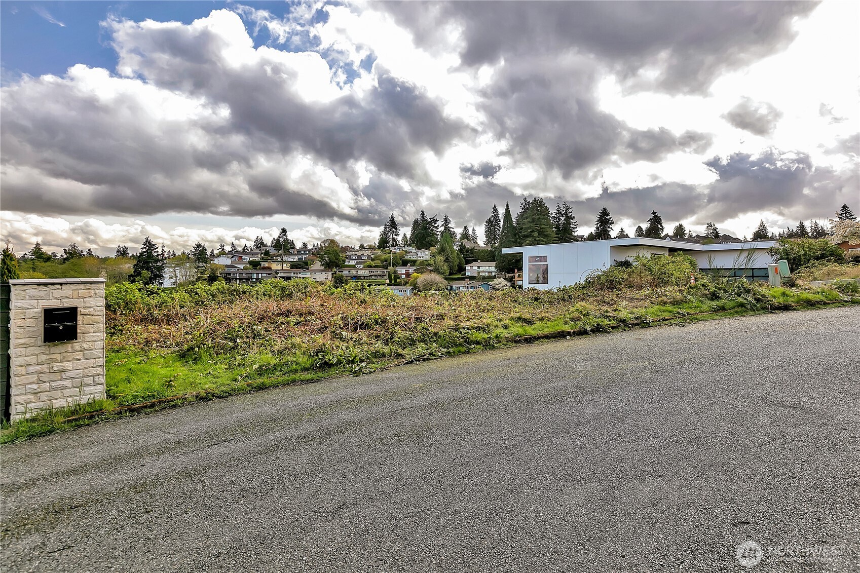 0 Southwest 297th Street Federal Way, WA 98023 - Photo 16 of 16 a view of a garden with a building