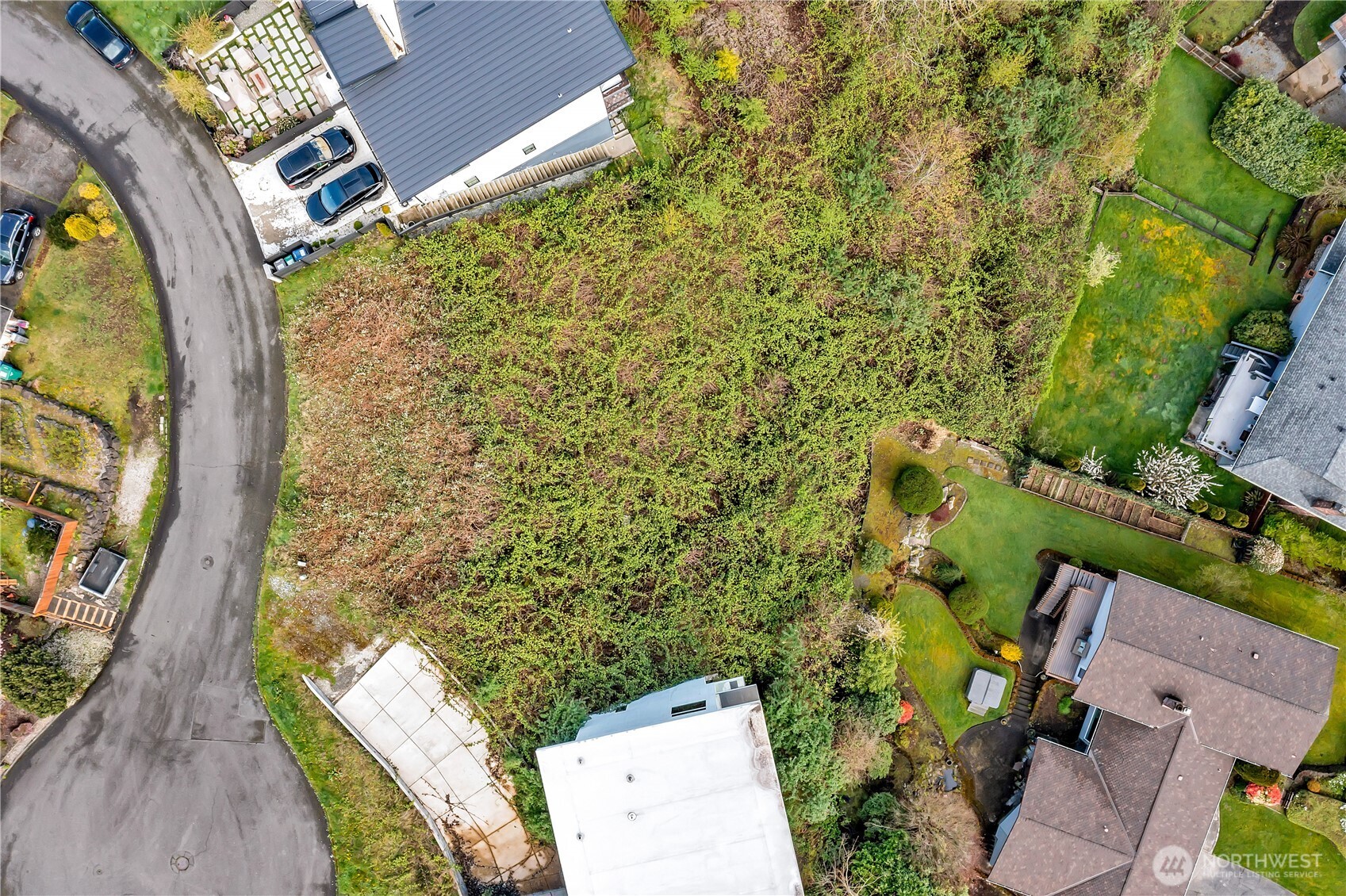 0 Southwest 297th Street Federal Way, WA 98023 - Photo 7 of 16 an aerial view of a house with swimming pool and garden