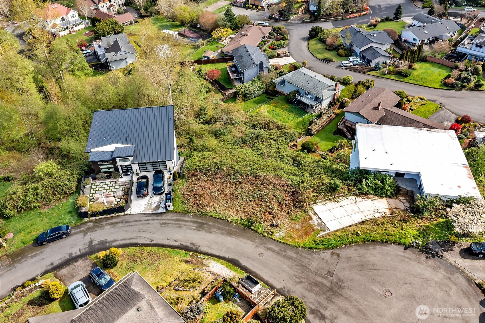 0 Southwest 297th Street Federal Way, WA 98023 - Photo 10 of 16 an aerial view of swimming pool with outdoor seating and trees