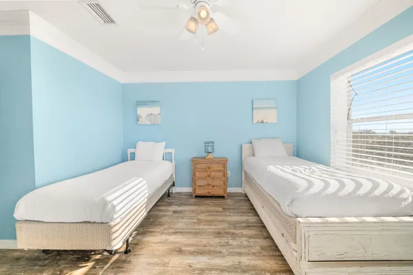 a bedroom with a bed and a couch