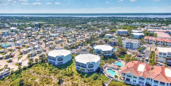 an aerial view of a city with lots of residential buildings