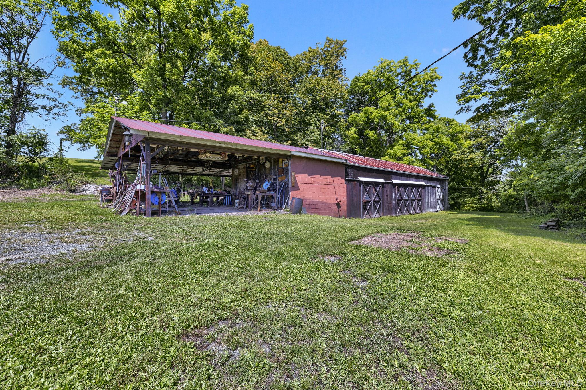 470 Little Britain Road Newburgh, NY 12550 - Photo 38 of 45 View of green lawn with an outbuilding