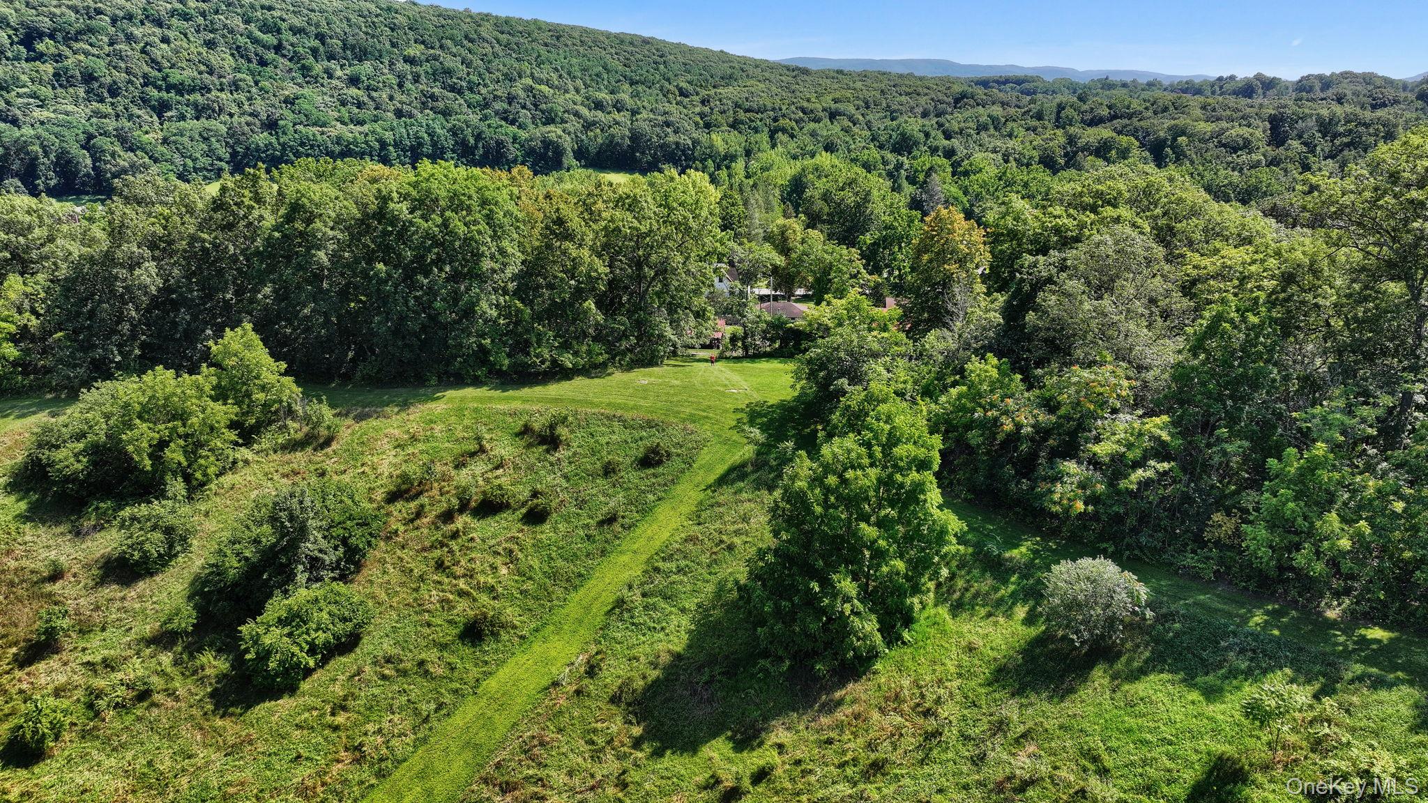 470 Little Britain Road Newburgh, NY 12550 - Photo 10 of 45 Aerial view of property and surrounding area with a forest