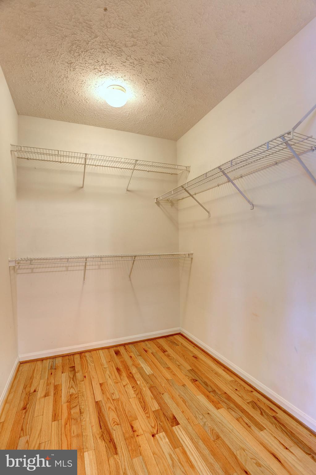 6136 Starburn Path Columbia, MD 21045 - Photo 18 of 35 a view of a room with wooden floor