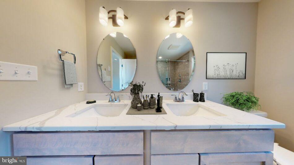 0 Marys Way, Unit ARDMORE Harrisburg, PA 17112 - Photo 16 of 21 a bathroom with a sink and a mirror