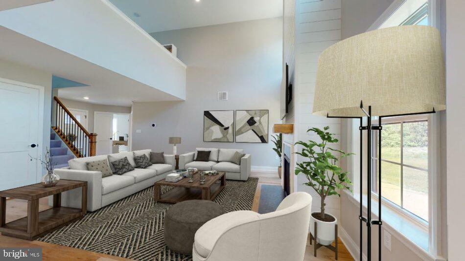 0 Marys Way, Unit ARDMORE Harrisburg, PA 17112 - Photo 8 of 21 a living room with furniture and a potted plant