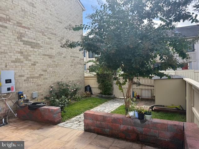 a view of hallway with wooden floor