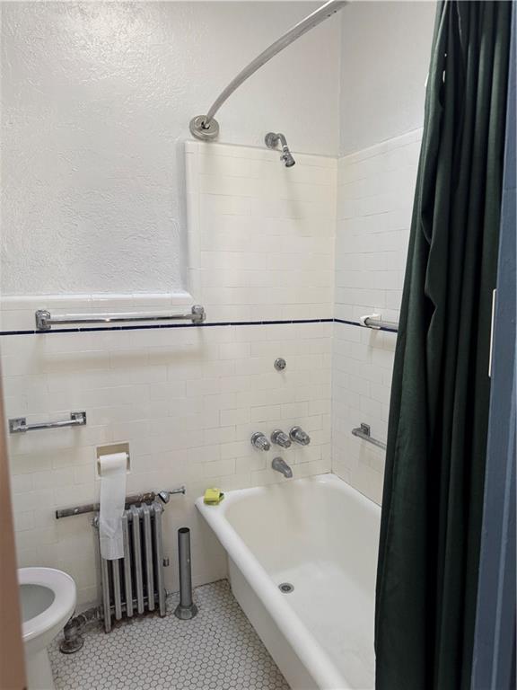 3112 Quentin Road Brooklyn, NY 11234 - Photo 6 of 6 a bathroom with a sink a toilet and shower