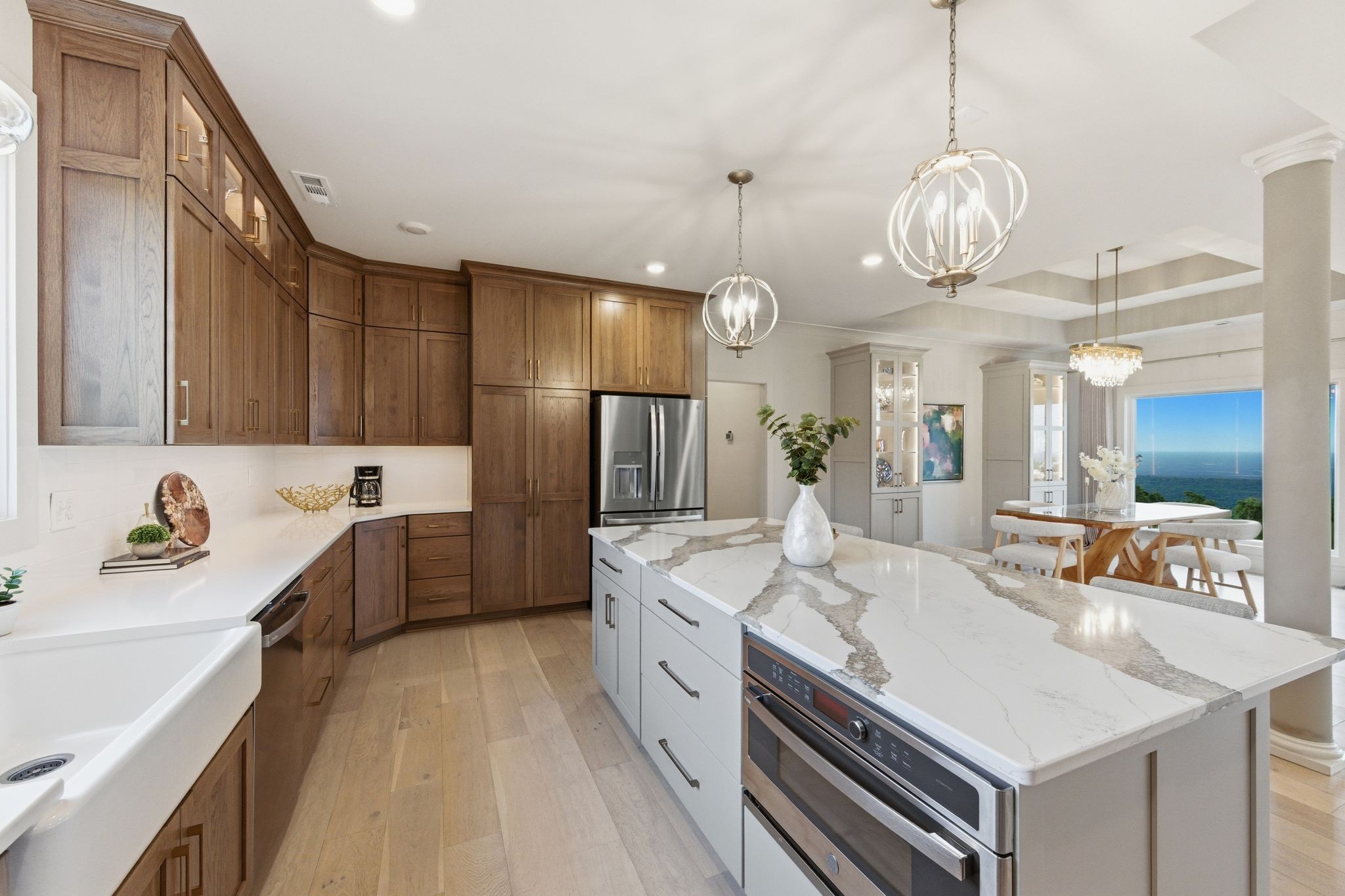 577 Box House Road Belvidere, TN 37306 - Photo 17 of 77 a large white kitchen with a chandelier