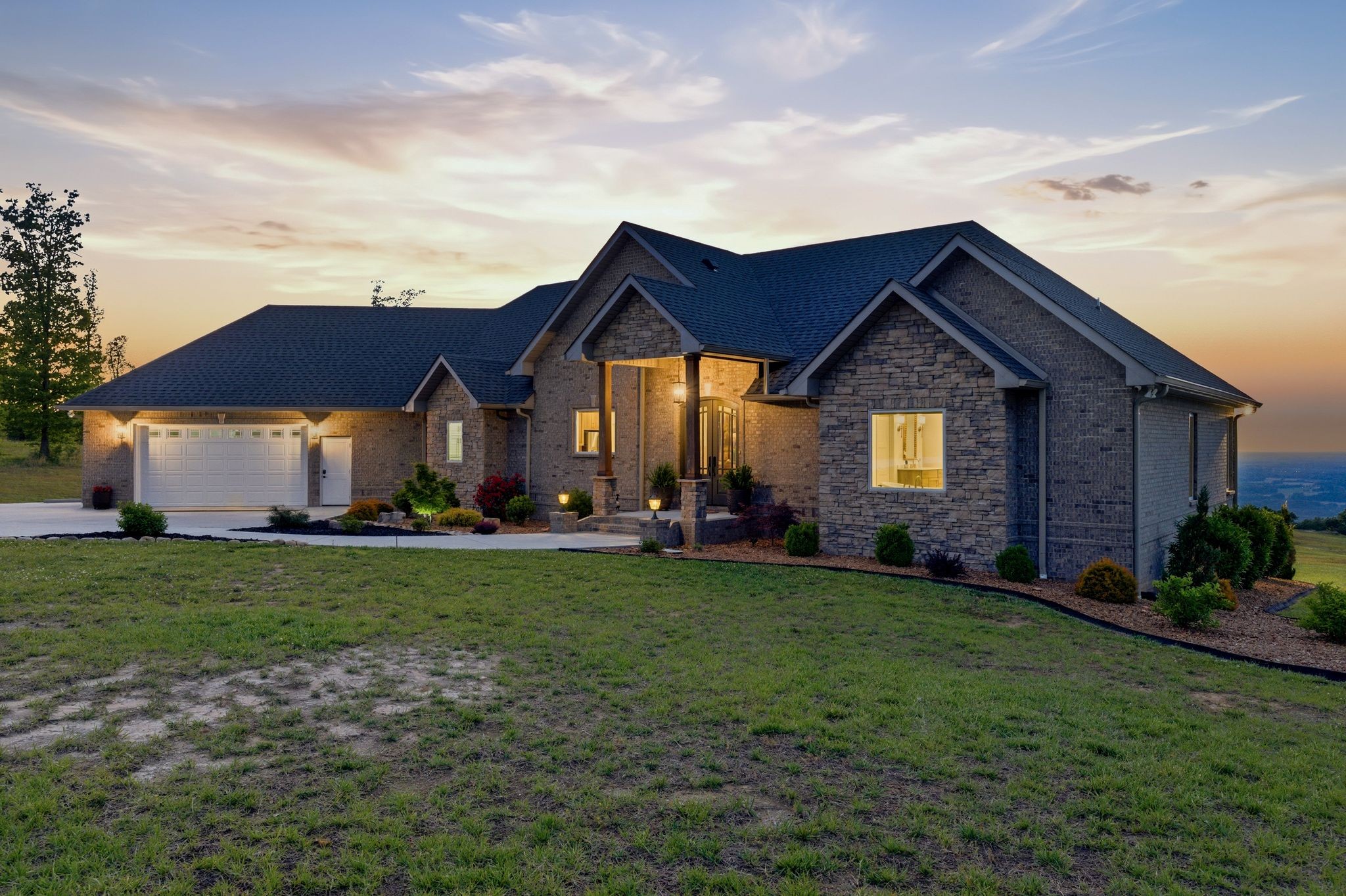 577 Box House Road Belvidere, TN 37306 - Photo 3 of 77 a house view with a garden space