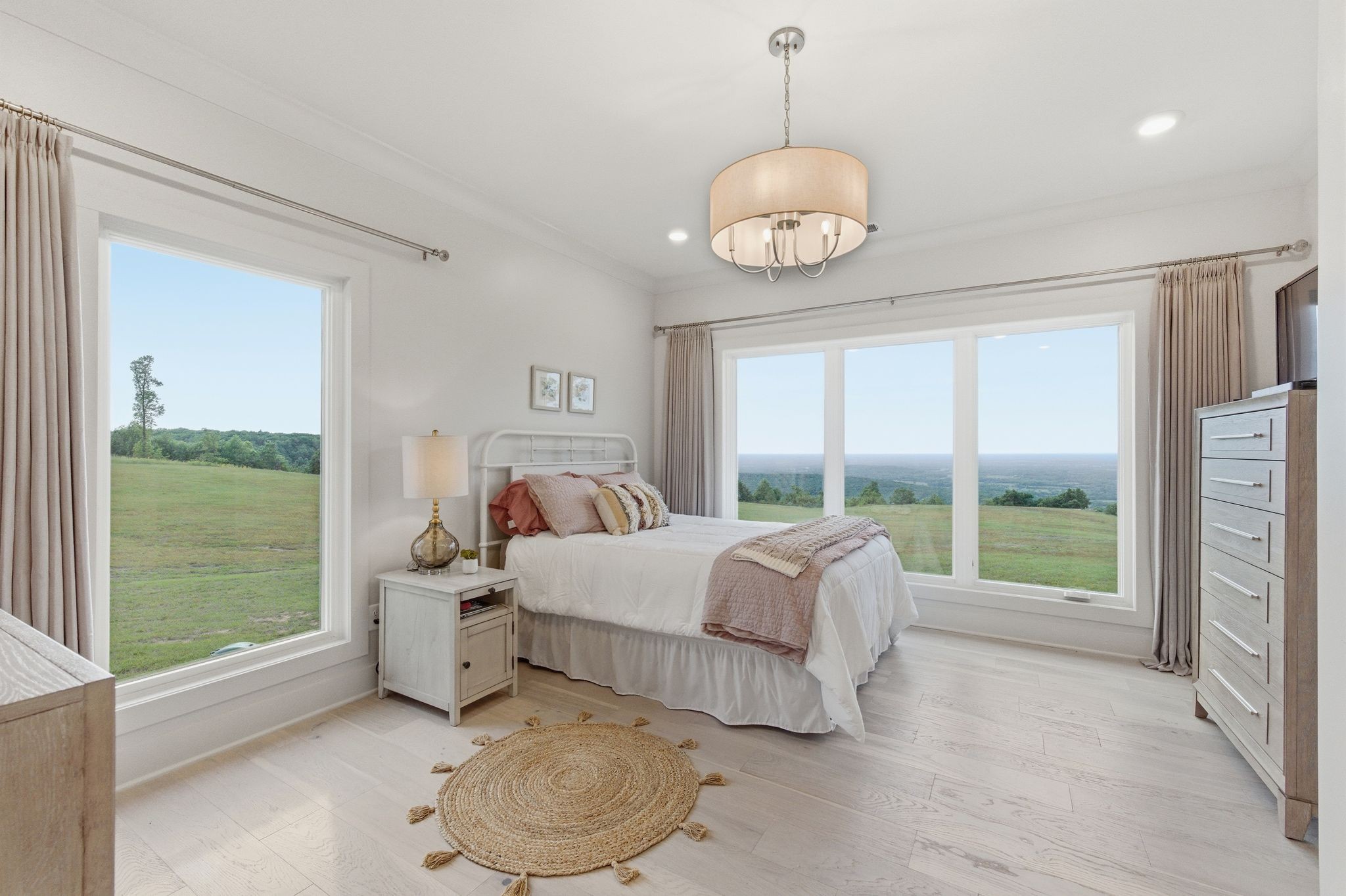 577 Box House Road Belvidere, TN 37306 - Photo 38 of 77 a bed room with bed and a large window