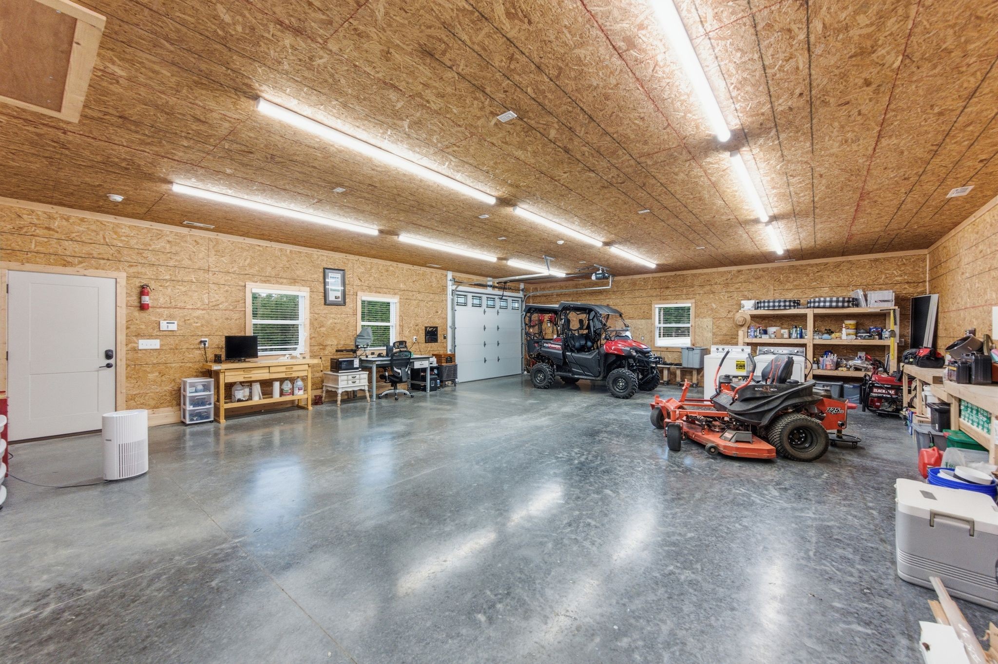 577 Box House Road Belvidere, TN 37306 - Photo 54 of 77 a view of a garage with parked cars