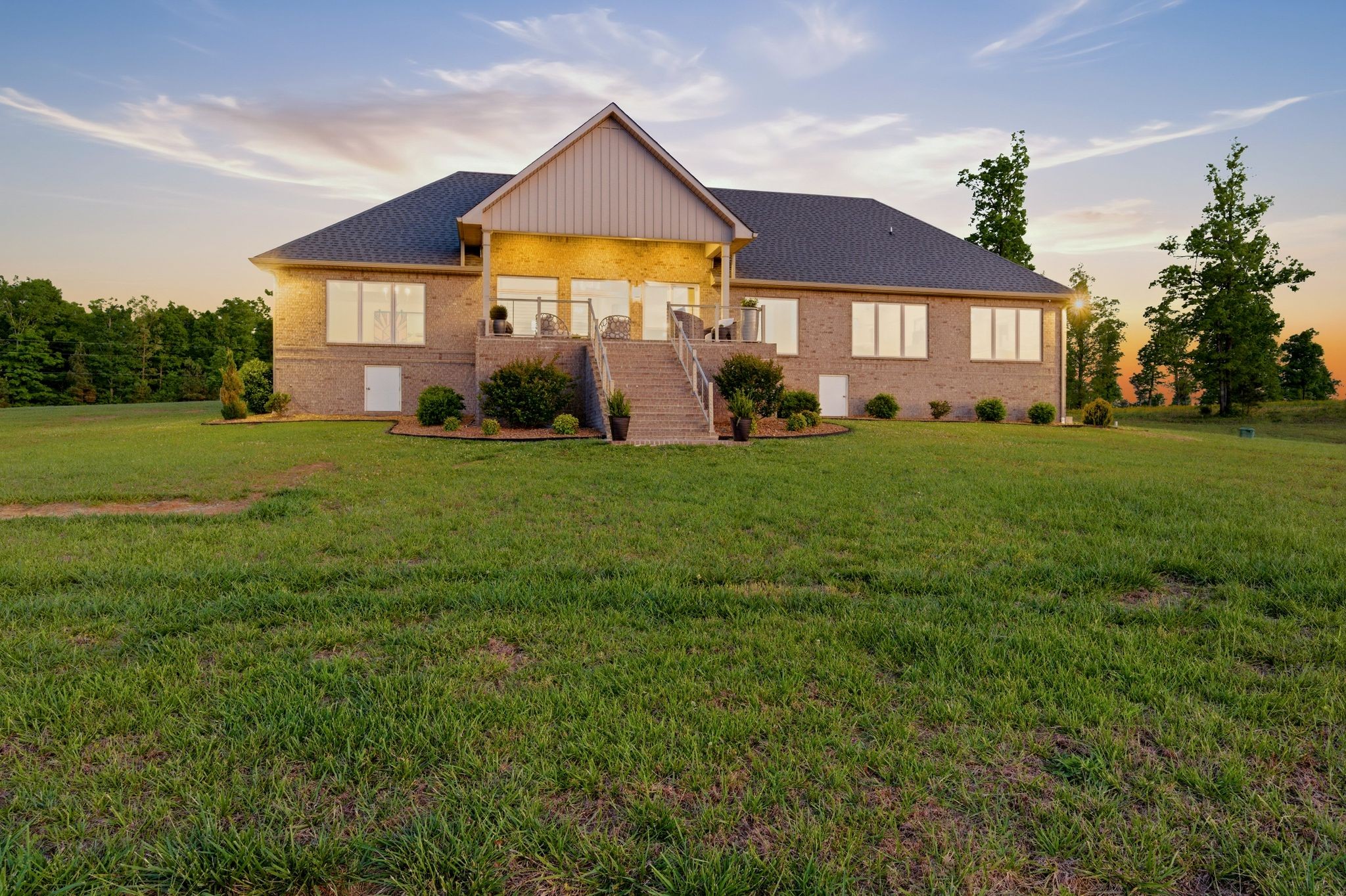 577 Box House Road Belvidere, TN 37306 - Photo 7 of 77 a front view of a house with a yard