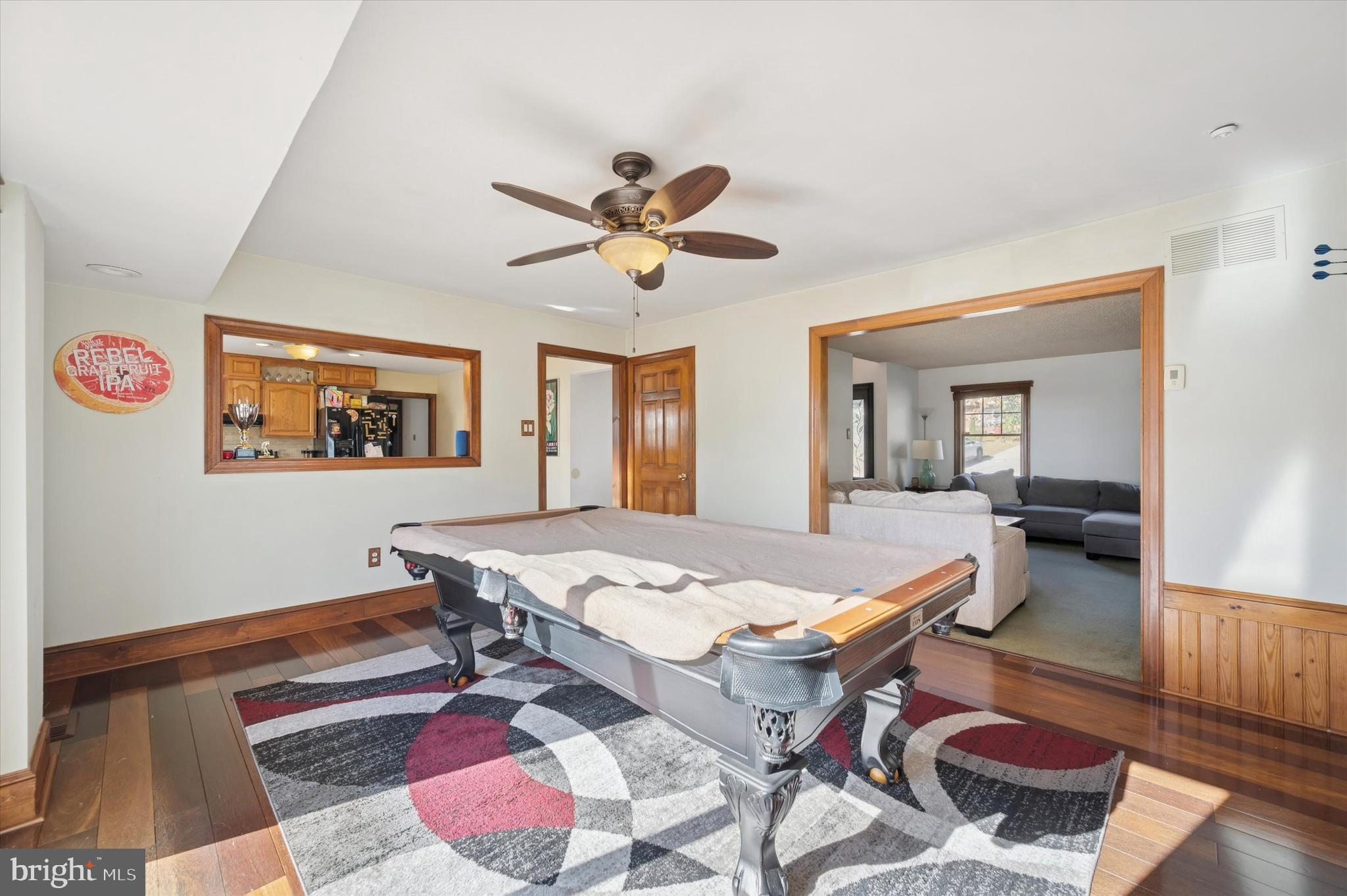 205 Delmar Street Philadelphia, PA 19128 - Photo 3 of 25 a view of a livingroom with furniture and a table