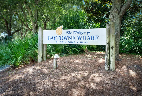 a view of outdoor space with signage and flags