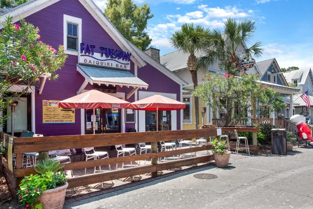 a view of a building with potted plants