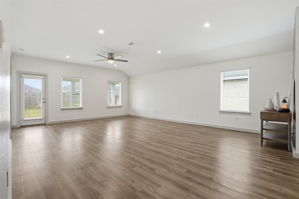 1022 Curly Angora Court Rosharon, TX 77583 - Photo 3 of 17 a view of an empty room with window and wooden floor