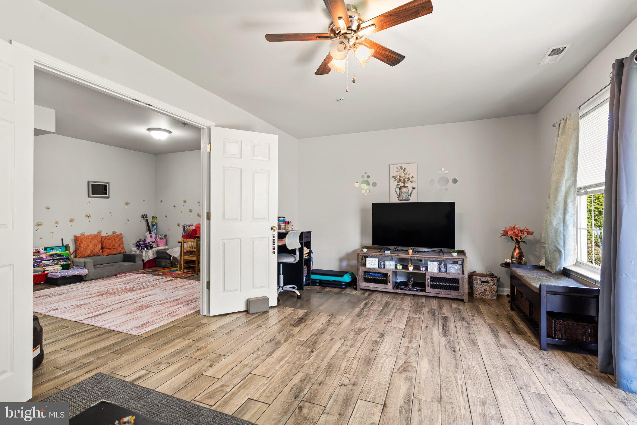 128 Sentry Ridge Smithsburg, MD 21783 - Photo 40 of 41 a living room with furniture and a flat screen tv