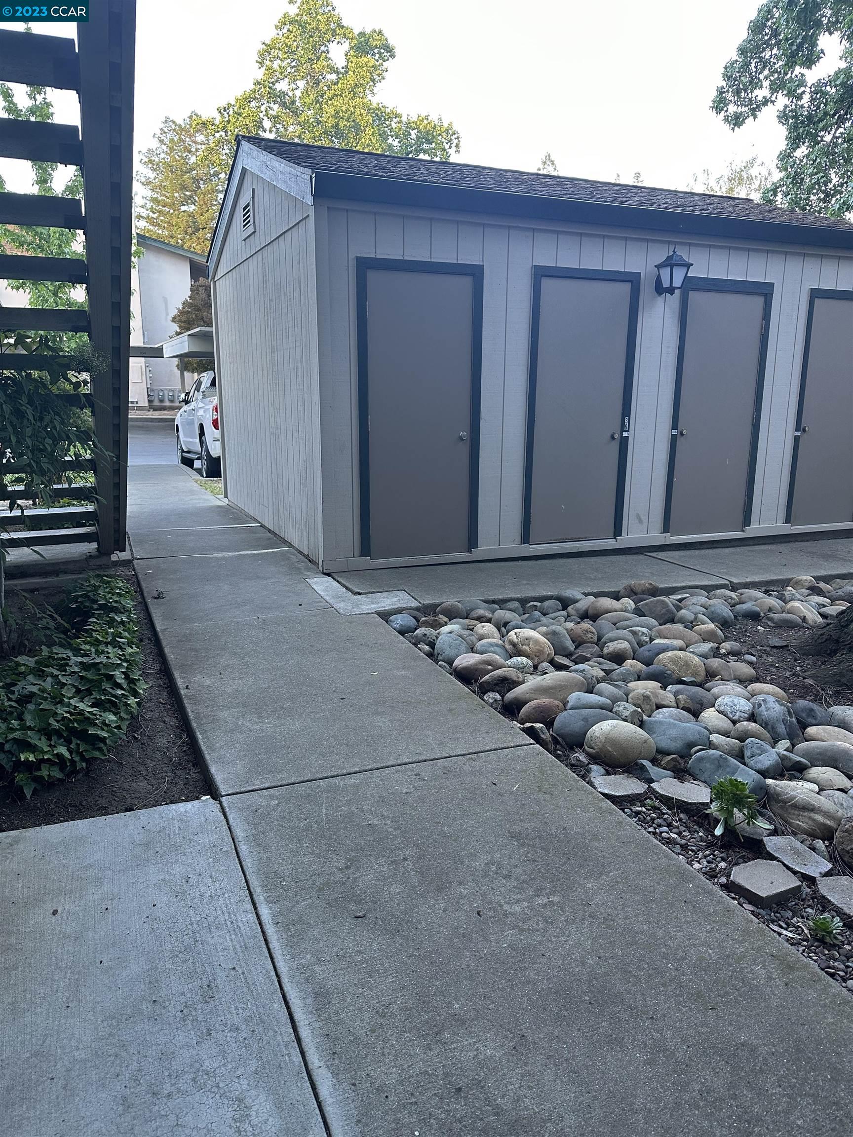 5460 Concord Boulevard Concord, CA 94521 - Photo 22 of 35 a view of a house with a wooden fence