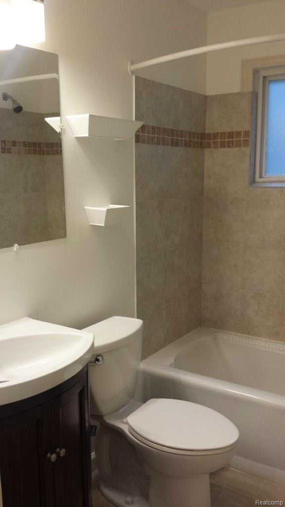 5369 Ridgemont Street Howell, MI 48843 - Photo 25 of 25 Elegant ceramic tile in shower and on floor!