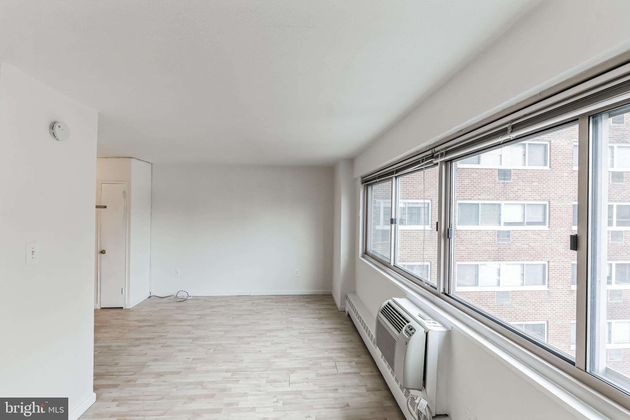 2101 Chestnut Street, Unit 1102 Philadelphia, PA 19103 - Photo 3 of 17 a view of an empty room and wooden floor