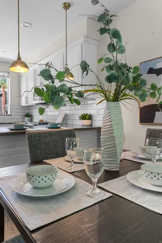 a vase of flowers sitting on a table