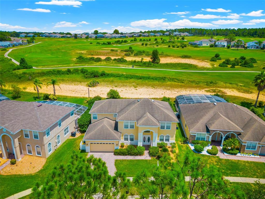 350 Kings Way Davenport, FL 33897 - Photo 1 of 56 an aerial view of a house with big yard