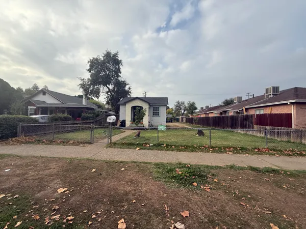 a view of house with outdoor space