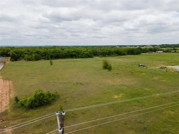 a view of a lake with a big yard