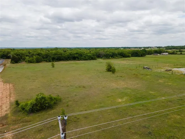 a view of a lake with a big yard