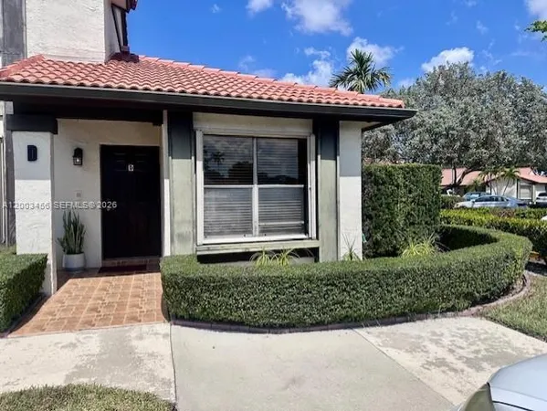 a view of a house with a porch