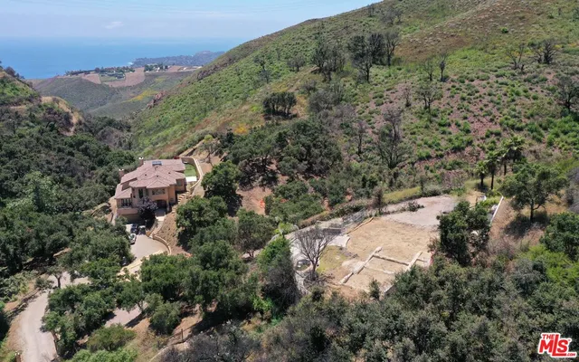an aerial view of house with outdoor space