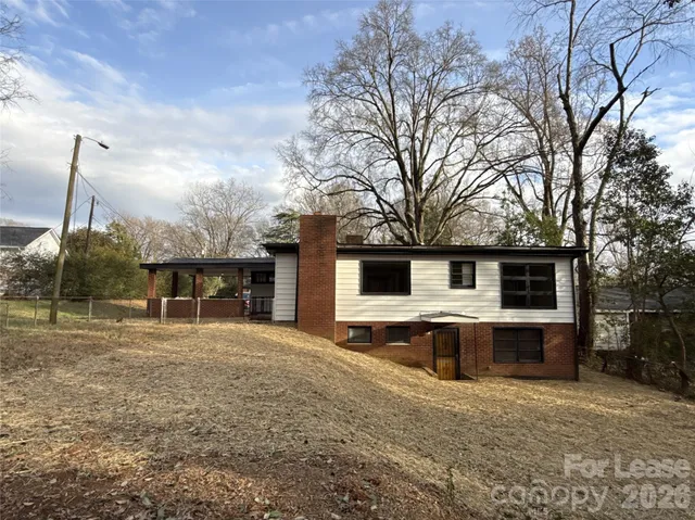 a house view with a backyard space