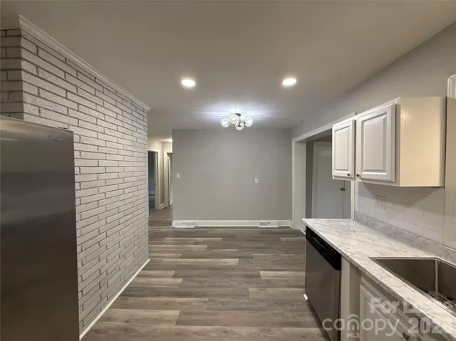 a bathroom with a sink and a shower