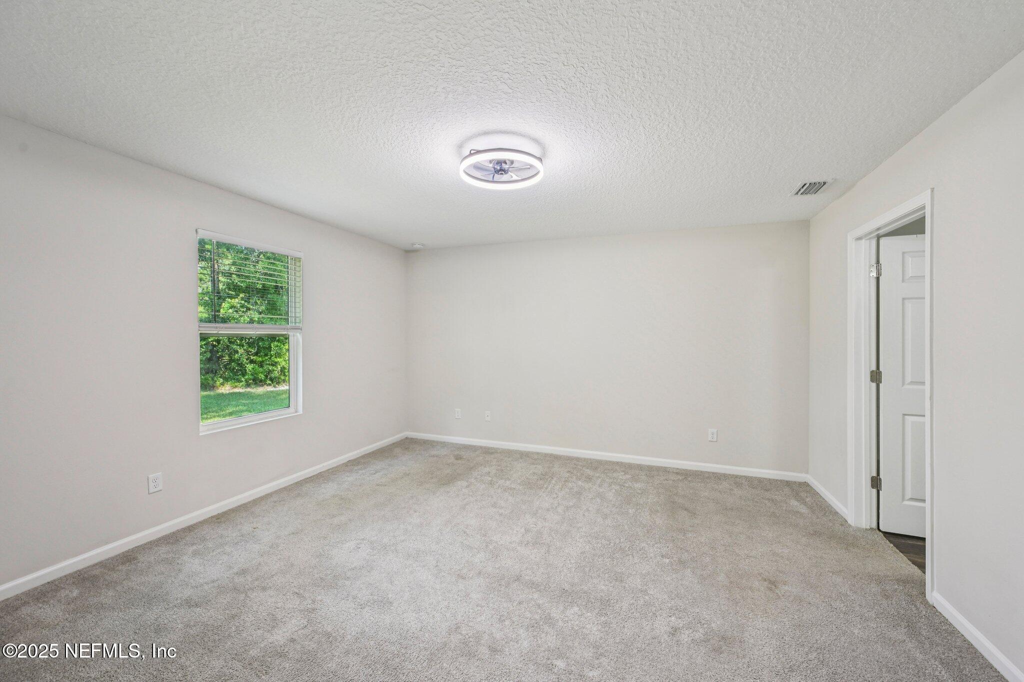 2400 Lundy Road Palatka, FL 32177 - Photo 14 of 34 an empty room with a window