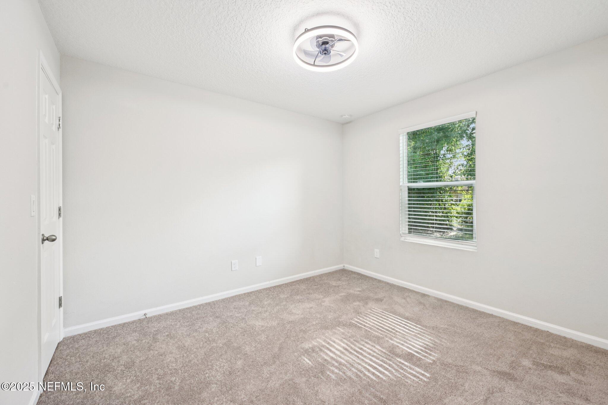 2400 Lundy Road Palatka, FL 32177 - Photo 19 of 34 an empty room with a window