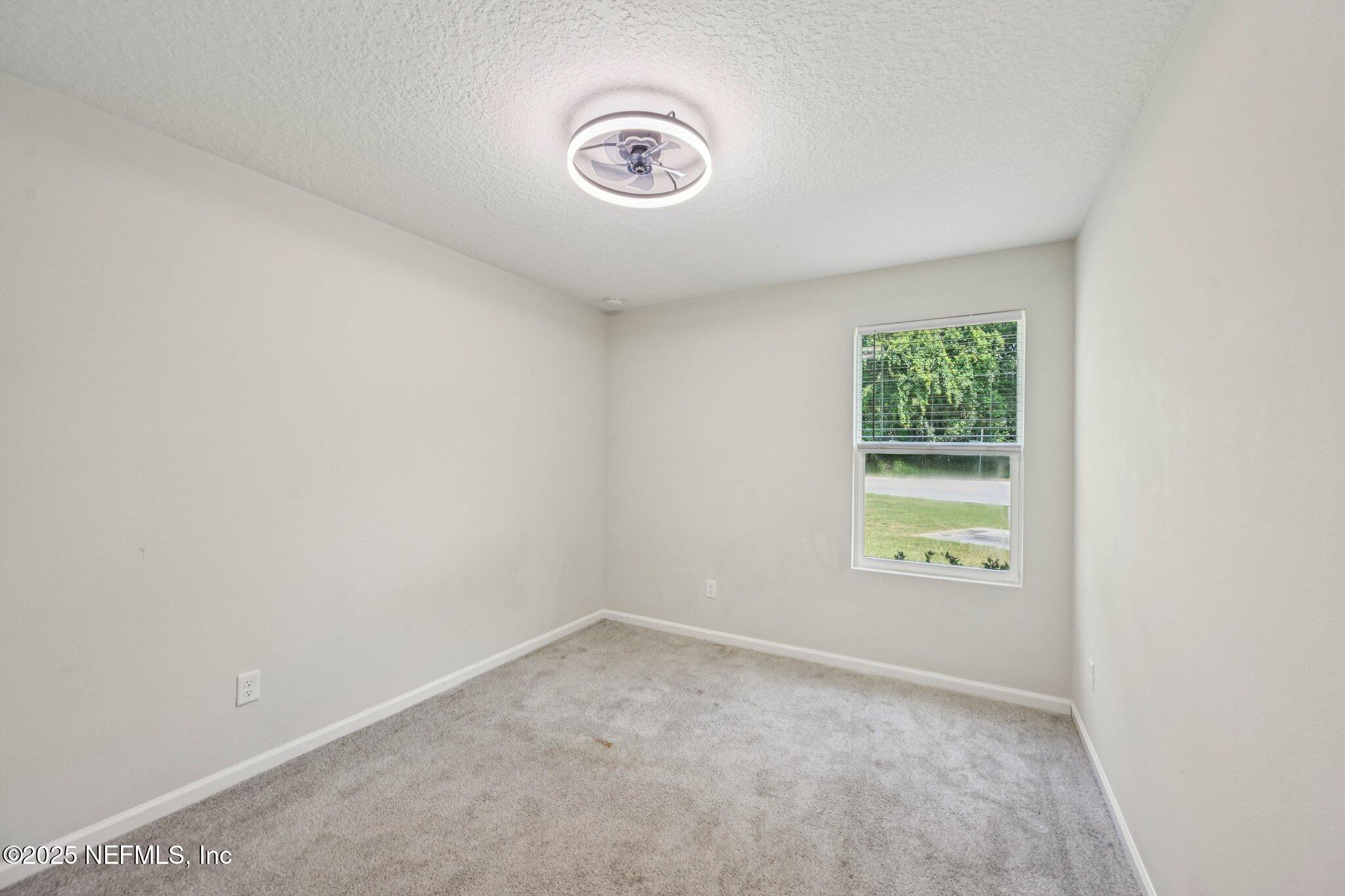 2400 Lundy Road Palatka, FL 32177 - Photo 20 of 34 an empty room with a window