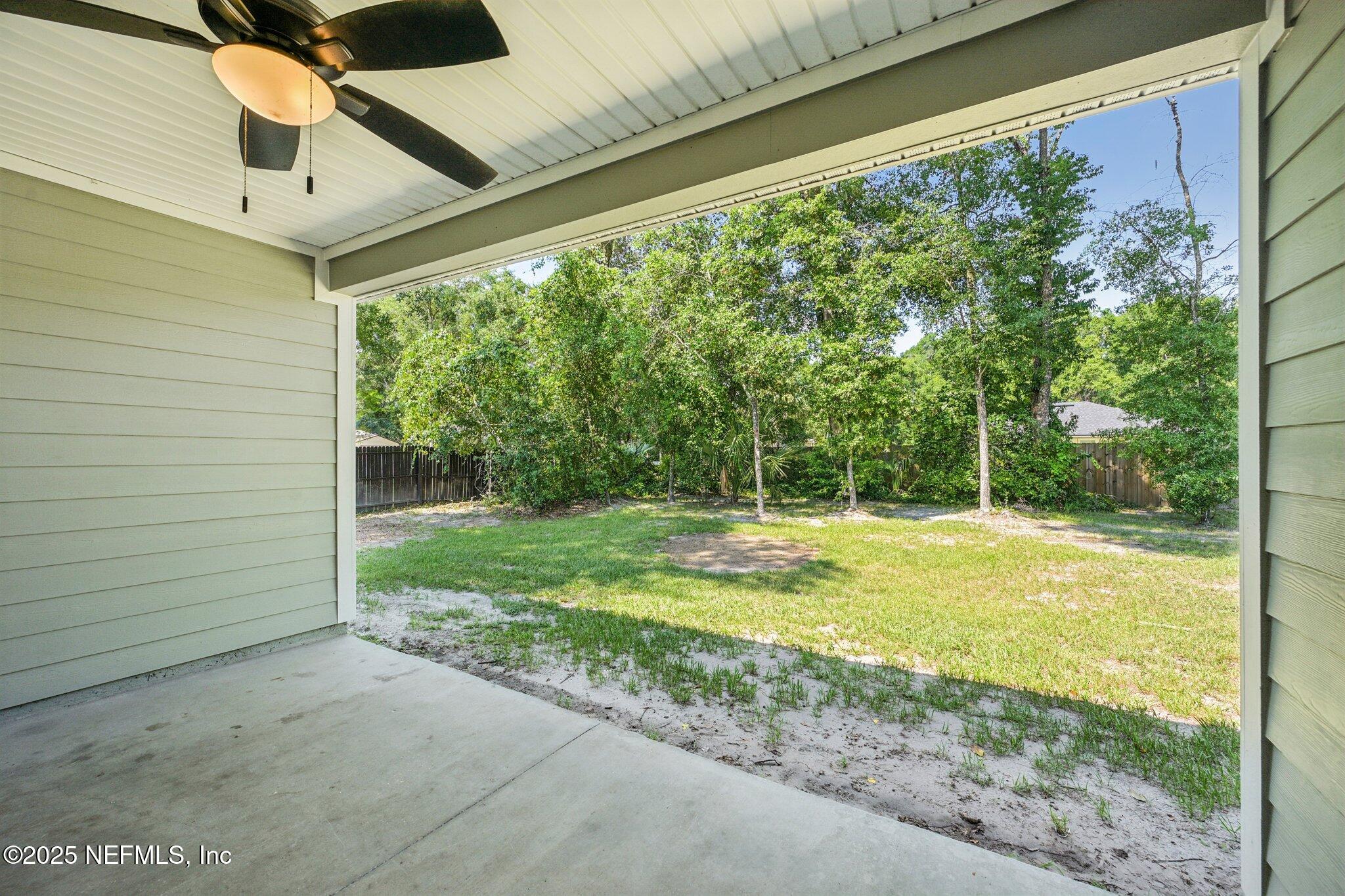 2400 Lundy Road Palatka, FL 32177 - Photo 26 of 34 a view of a swimming pool with a yard