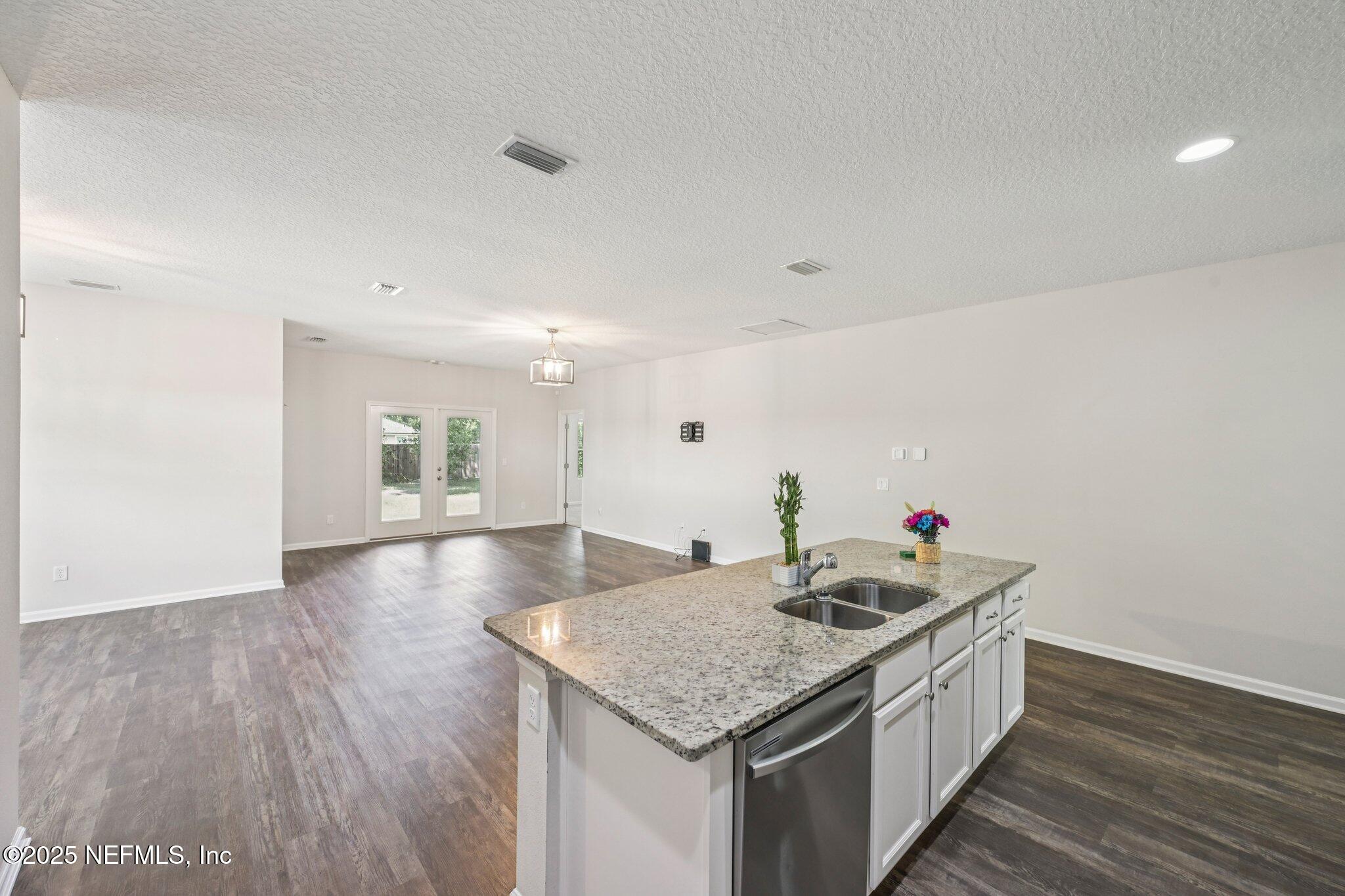 2400 Lundy Road Palatka, FL 32177 - Photo 6 of 34 a kitchen with a sink and cabinets