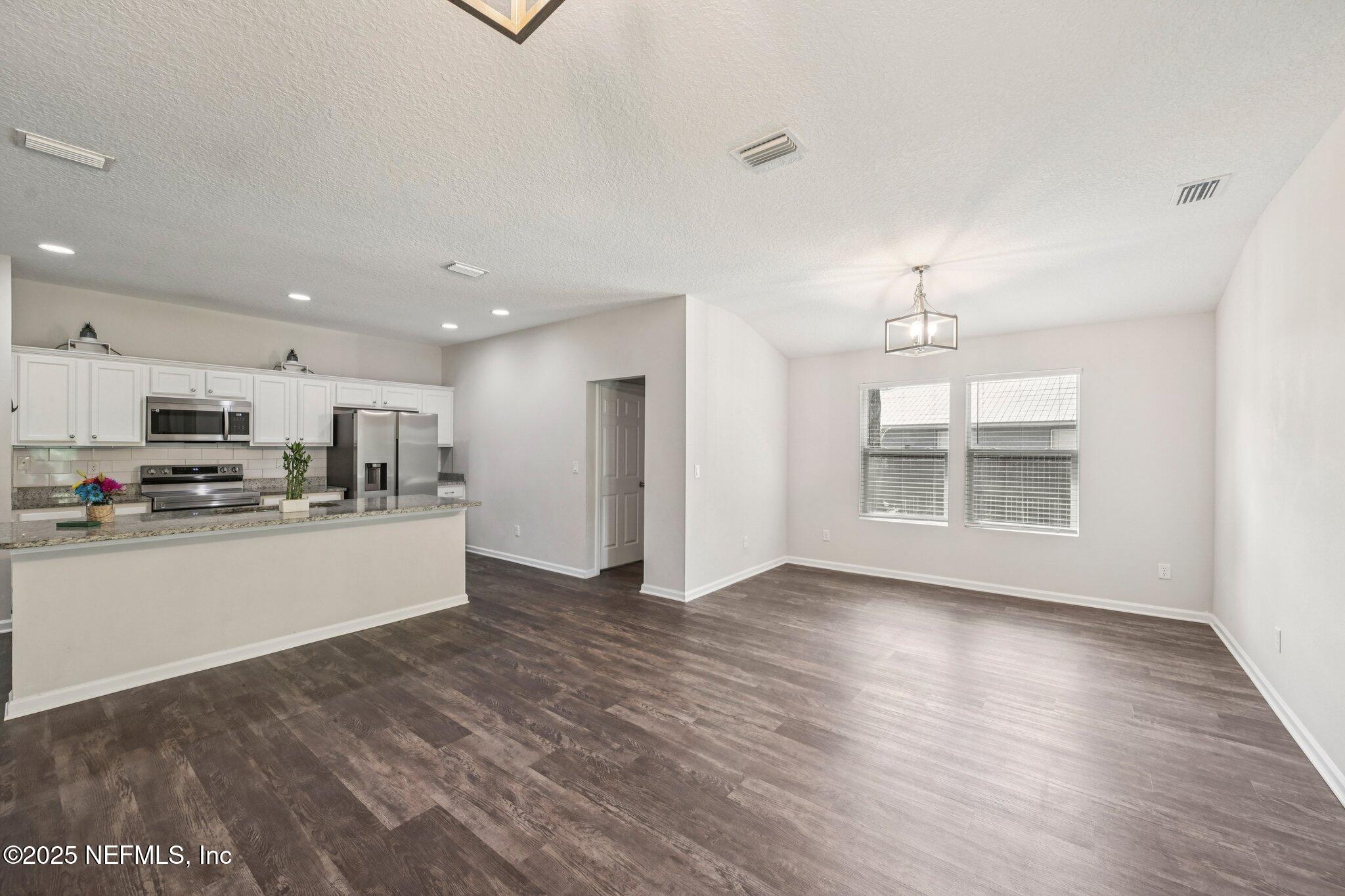 2400 Lundy Road Palatka, FL 32177 - Photo 10 of 34 a view of kitchen with wooden floor