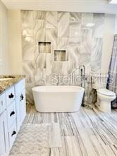 512 Wideview Avenue Tarpon Springs, FL 34689 - Photo 20 of 30 a view of a bathtub in a bathroom